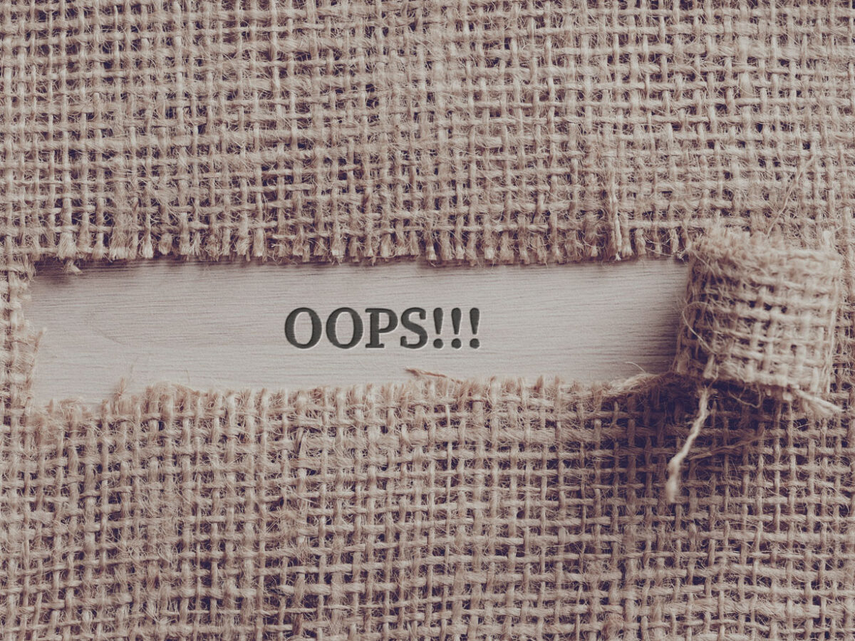 Cloths torn in the middle with the word "oops!!" shown.